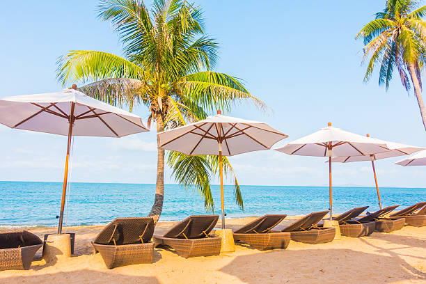 istock Parasol and chair on the beach 638952034