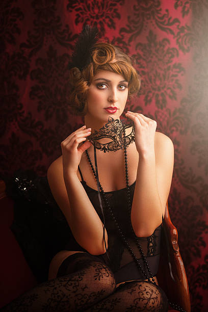 istock young woman with masquerade mask 638953202