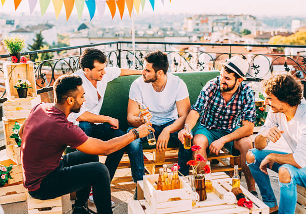 istock Friends having a party on the roof 638953380