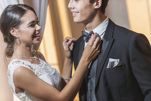 istock Young couple in formal attire 638958092