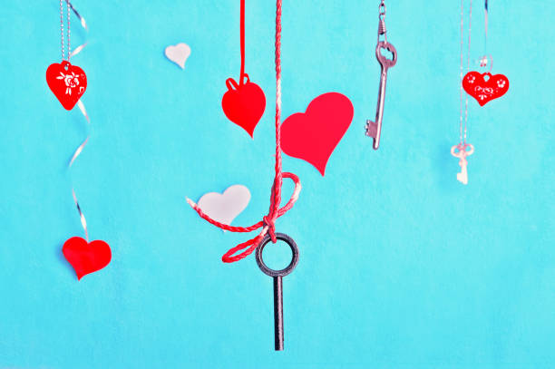 istock Keys And Hearts Against The Turquoise Background 638958308