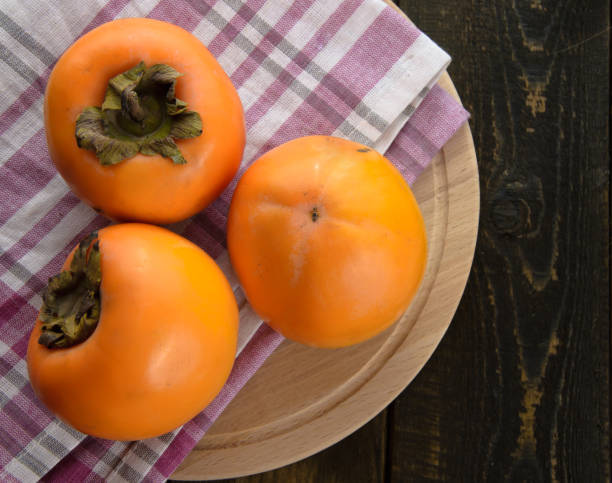 istock fresh fruits on wooden table, close-up. 638958806