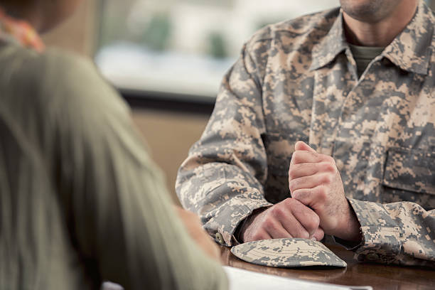 istock Unrecognizable veteran meets with military psychiatrist 638959842
