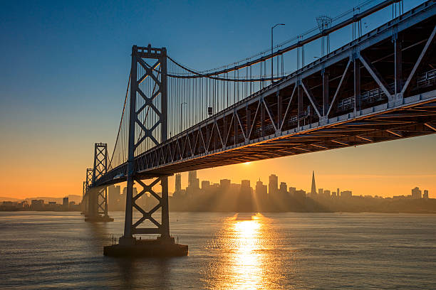 istock Bay Bridge and San Francisco skyline at sunset 638960488