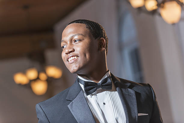 istock Young black Hispanic man wearing tuxedo 638962326