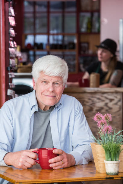 istock Mature Man in Coffee House 638963028