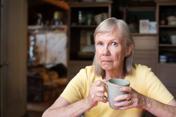 istock Angry mature woman holding cup 638963128