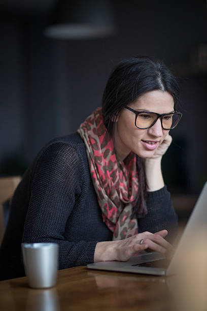 istock Surfing the net at home 638964946