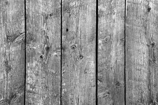 Vertical barn board background with silver colored planks