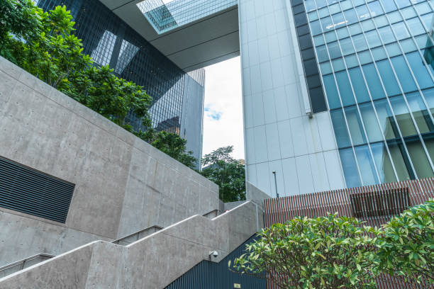 istock modern glass steel architecture on cloudy sky 638967752