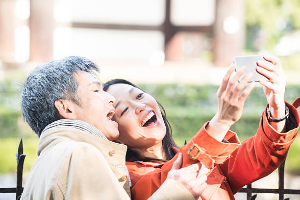 Business people taking a selfie