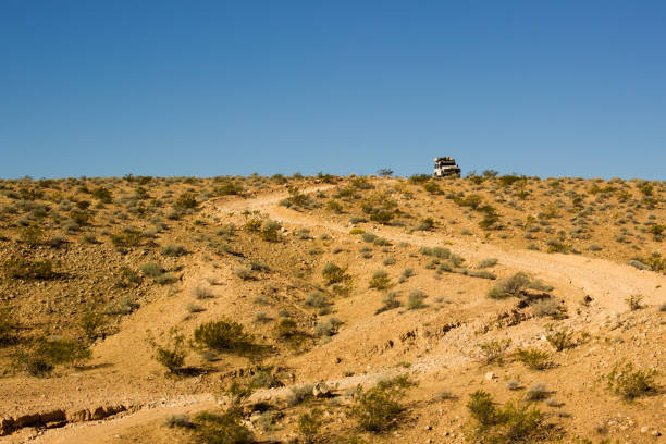 istock Car on a dirty road 638972322