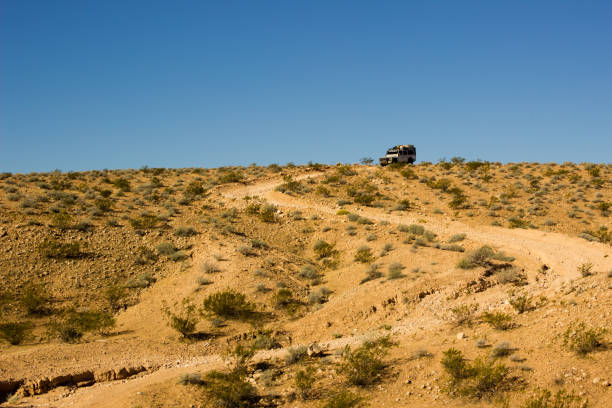 istock Car on a dirty road 638972336