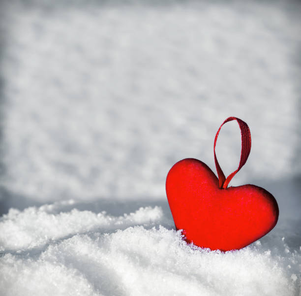 istock Red heart on the snow 638978950