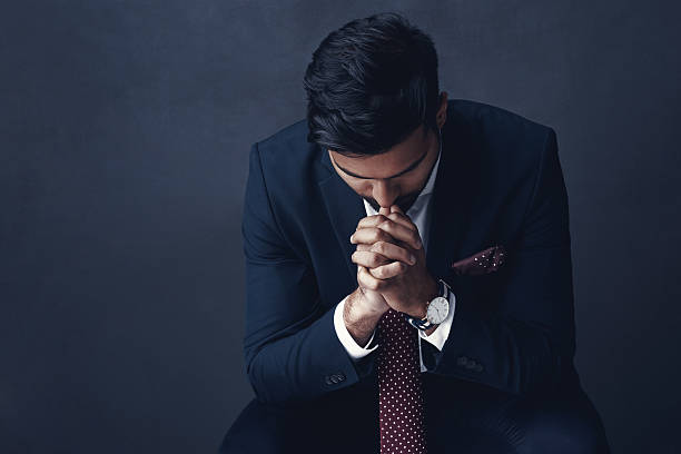 istock Praying for strength to make it through a business challenge 638979078
