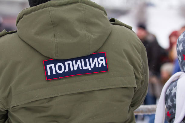 istock Russian police - emblem on the back OMON at winter 638979150