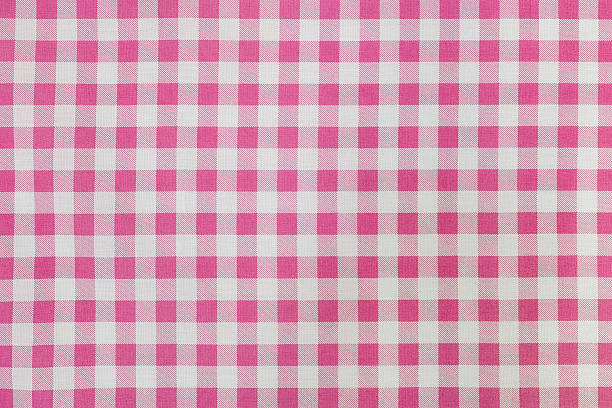 istock Pink and white Gingham style cotton background. 638980204