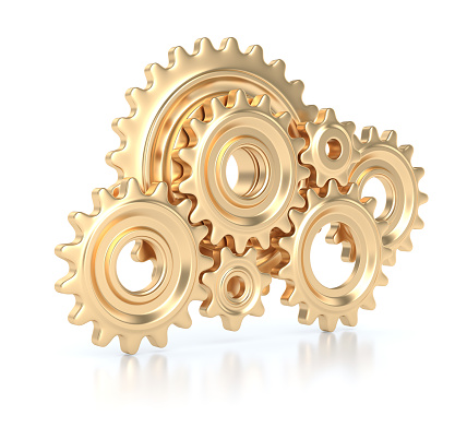 Gold gears isolated on white background