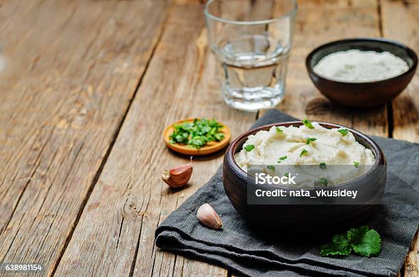 Ricotta Roasted Garlic Mashed Cauliflower Stock Photo - Download Image Now - Cauliflower, Cilantro, Crucifers