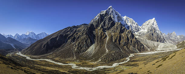 istock Soaring mountain peaks panorama remote Himalayan valley Khumbu Nepal 638983290