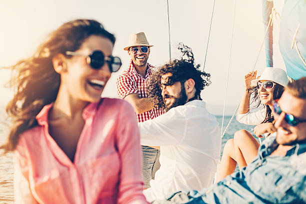 istock Cheerful people on a yacht 638984008