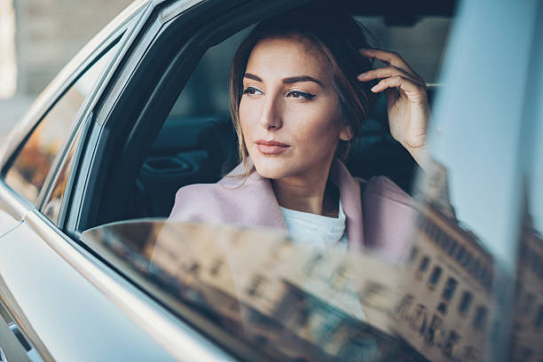 istock Upper class woman in a car 638984550
