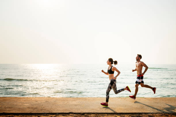 istock Running Exercise Training Healthy Lifestyle Beach Concept 638987976