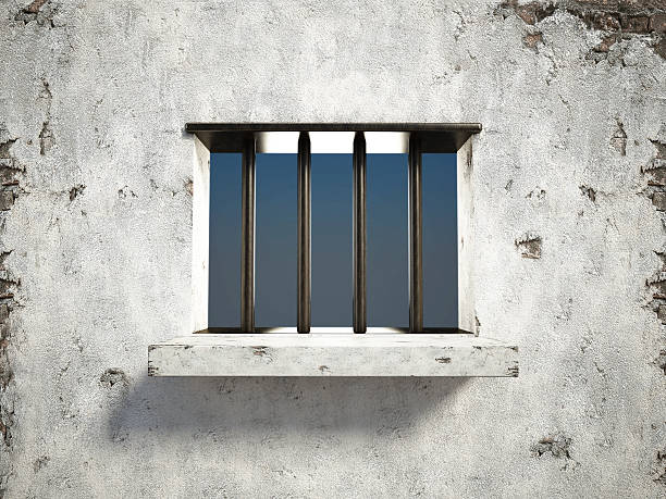 тюрьма окно  - barred windows стоковые фото и изображения