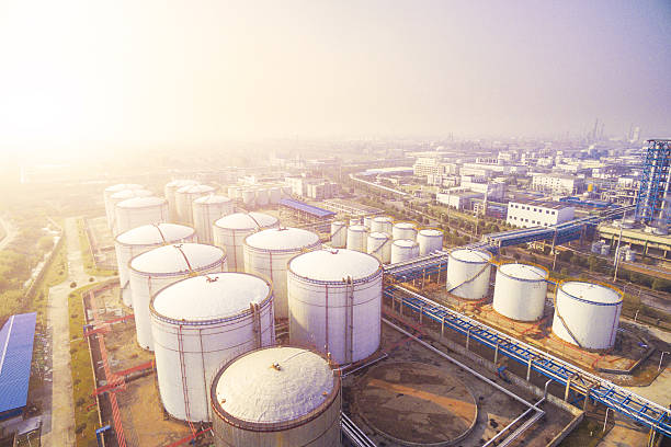istock oil containers in modern refinery plant in blue sky 638989660