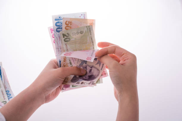 istock Hand holding Turksh Lira banknotes  in hand 638989804