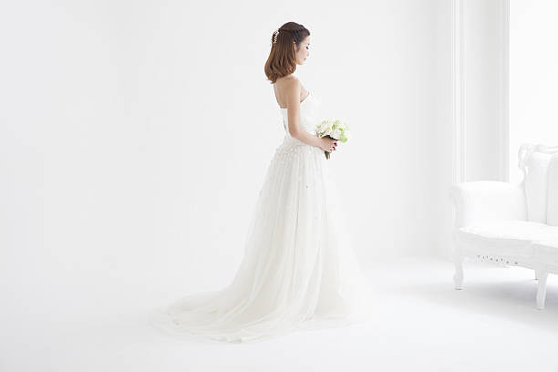 istock Woman in a wedding dress is beautiful. 638990110