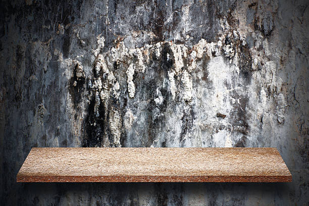 istock Empty top of natural stone shelves and stone wall 638992820