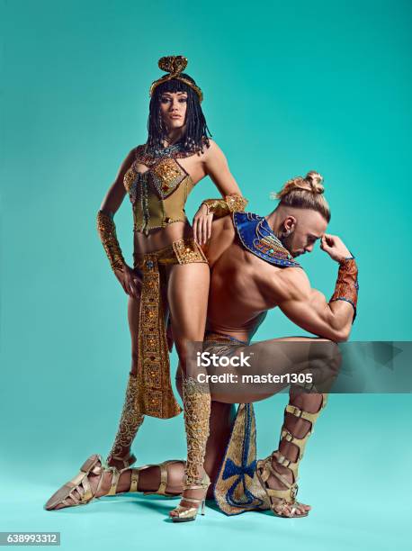 The Man Woman In The Images Of Egyptian Pharaoh And Stock Photo - Download Image Now