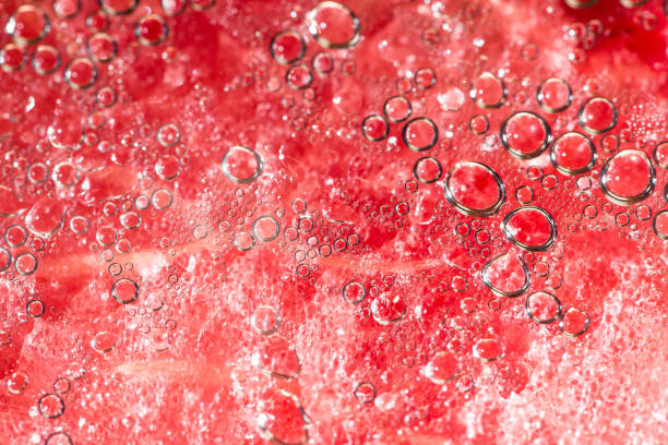 istock Water drops on the watermelon background. Detailed closeup. Abstract texture. 638994618