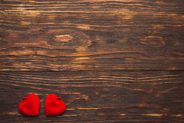istock two hearts on a wooden background 638994628