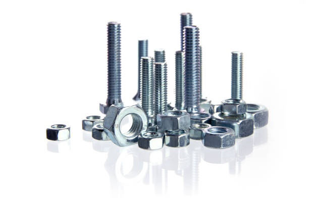 istock bolts and nuts standing like a skyline isolated on white 638995018