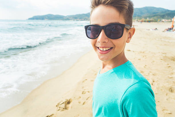 istock Portrait boy near the sea 638995268