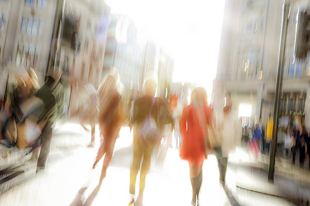 istock Motion Blurred People Walking Down Street 638996150