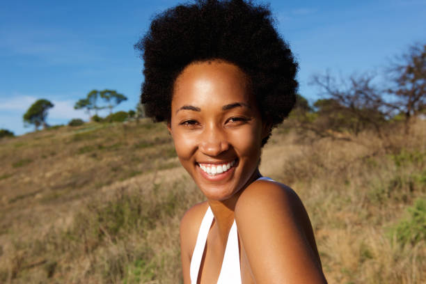 istock Attractive young female runner in field 638997134