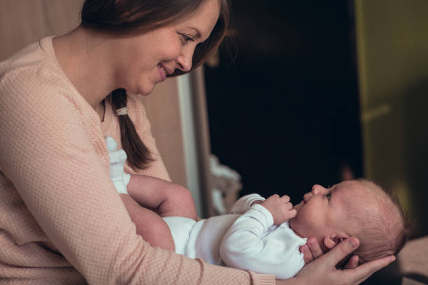 istock Playing in a mommys arms 638999698