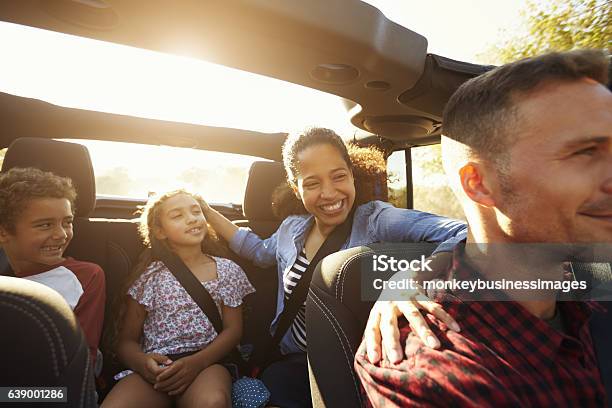 Happy Family On A Road Trip In Car Front Passenger Stock Photo - Download Image Now