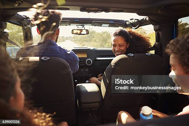 Excited Family On A Road Trip In Car Rear Passenger Stock Photo - Download Image Now