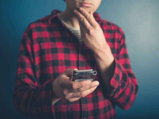 istock Hipster man with smart phone 639001410