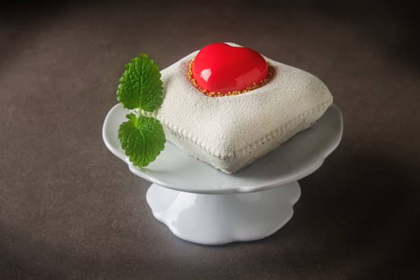 istock Delightful, luxury mousse cake in the form heart. Valentine's 639002804