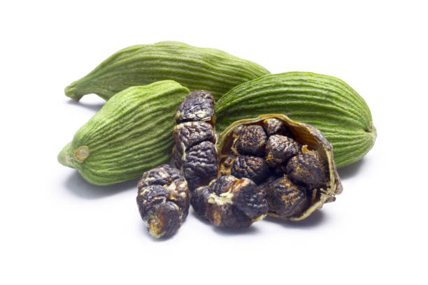 istock Dried green cardamom pods and seeds, paths 639002904