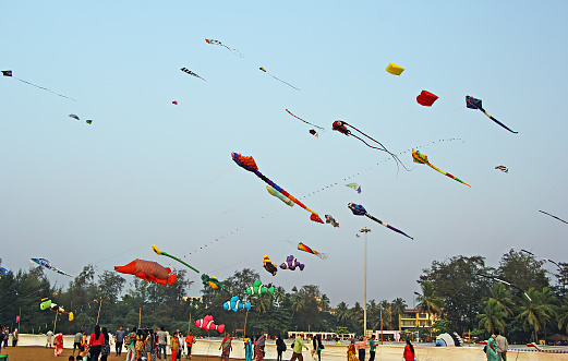 Miramar Beach, Goa, India - January 17, 2017: National and international kite flyers and enthusiasts display their creations and skills at the Goa International Kite Festival 2017 in Miramar Beach in Goa, India.