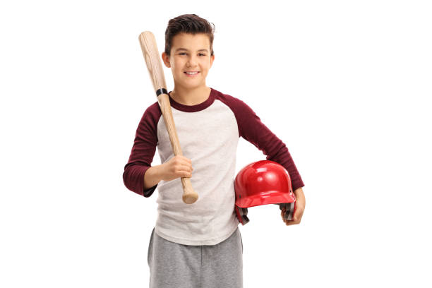 восхищенный ребенок бейсбольной битой и шлемом - baseball bat фотографии стоковые фото и изображения