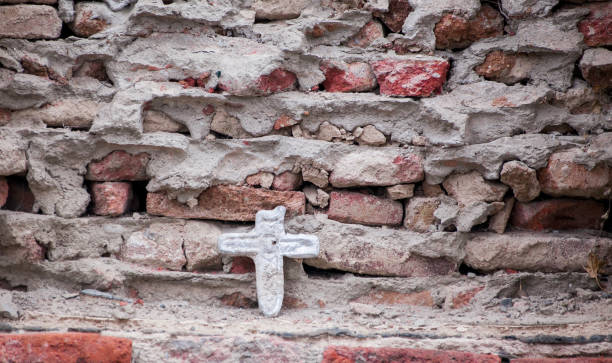 istock old stone cross on the wall in retro design 639010518
