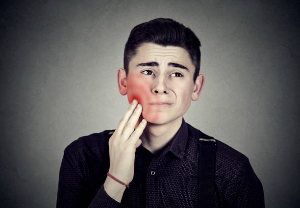 istock Sad young man with a toothache 639014912