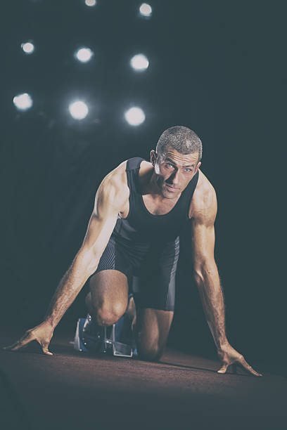 istock Athlete in race start position 639016648